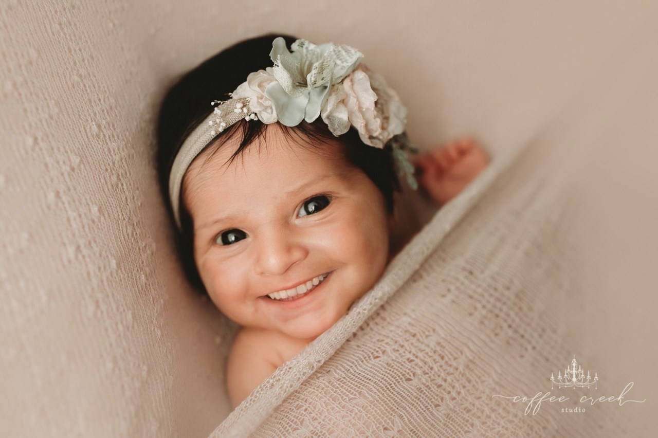 These photo is adds full sets of teeth to newborn photos and the results are both funny and creepy